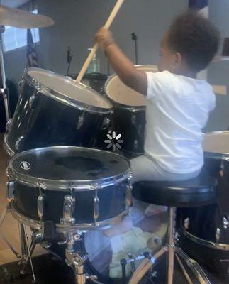 My baby playing drums at the church!