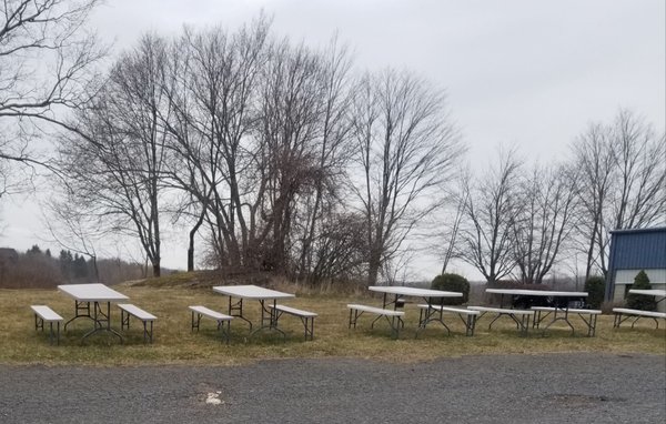 Picnic tables near parking area