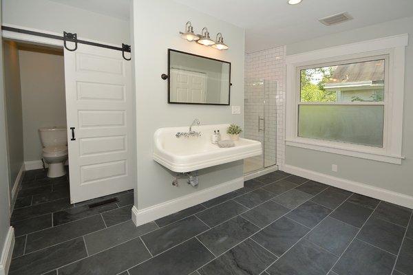 Salvaged farm house sink and used for bathroom rehab