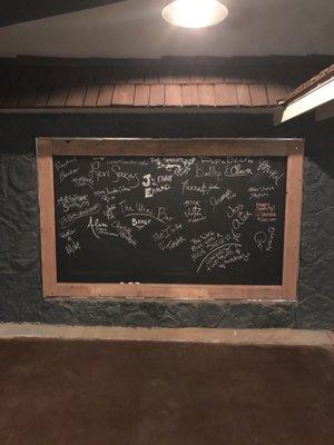 Autograph chalk board in the back