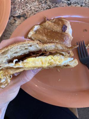 Bacon egg and cheese breakfast croissant sandwich