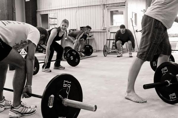 happy group learning the lifting technique