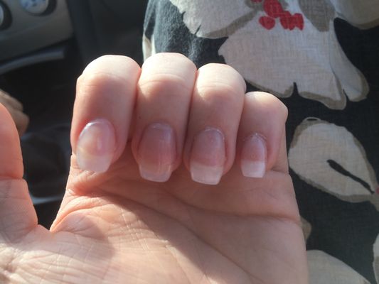 Not only do I have uneven tips, but you can also see my real nail through what was suppose to be a pink color, not clear.