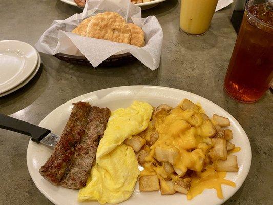 Onion sausage with scrambled eggs and hashbrowns