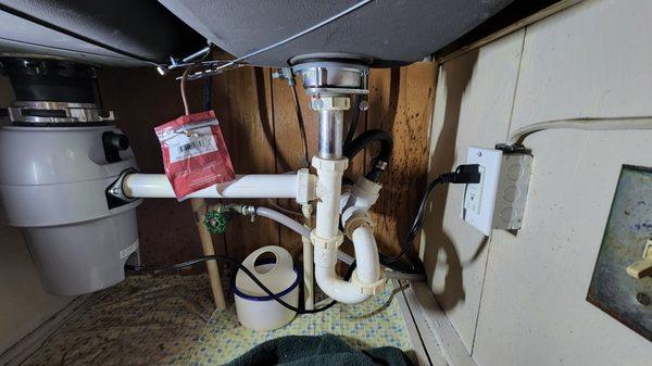 New Garbage disposal and GFI Power outlet installed under sink