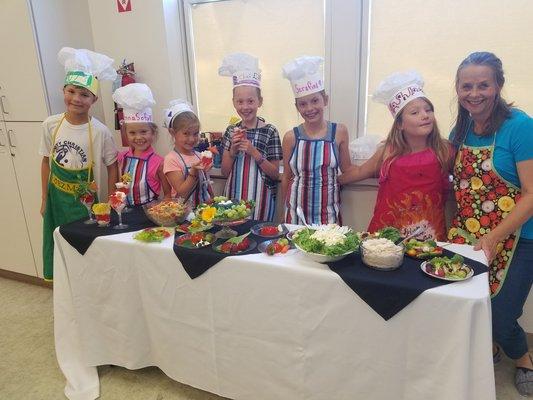 New chefs displaying their creations at the Eat with Your Eyes Cooking Camp!