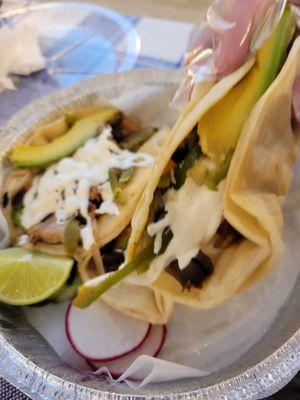 Tacos with fried pork and lengua