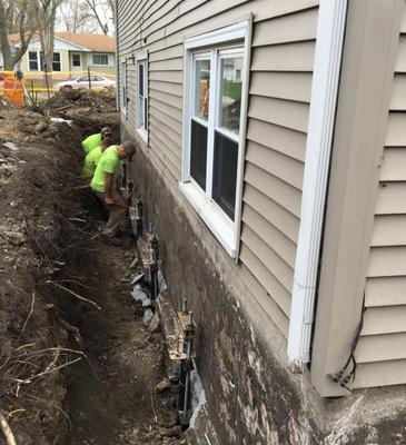 Foundation Repair with Helical Piers