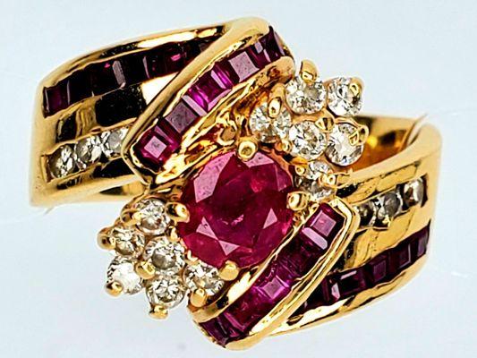 This is a bypass ring with rubies and diamonds all over it. Very stunning and beautiful.