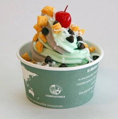 Irish Mint and Cookies and Cream yogurt topped with Cap'n Crunch, chocolate chips and shaved coconut