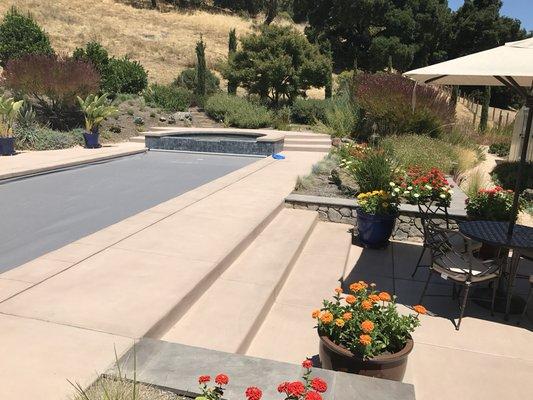 This pool deck turned out so beautiful! It has a broom finish with BRICKFORM color hardener. The color is Blush Beige (1015)