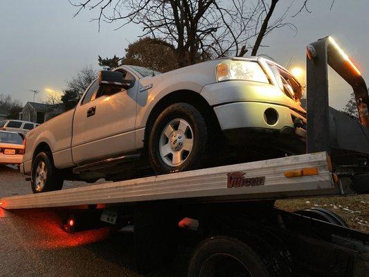 Unloading my truck off the tow truck