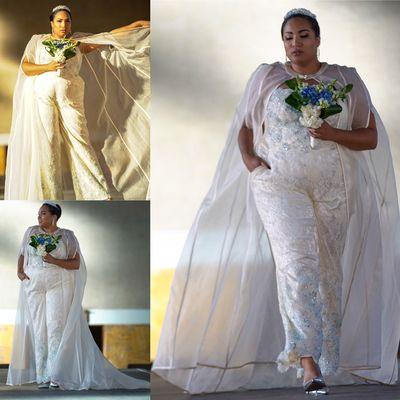 Custom ivory and blue lace wedding jumpsuit and organza cape