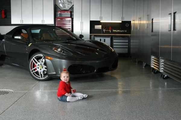 Low-maintenance epoxy floor coatings make garage floors friendly for anyone in the family. Want to know more? CALL (636) 256-6733 today.