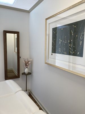 "A serene, minimalist brow studio with modern decor, designed for relaxation while Ivana Denniston perfects your brows."