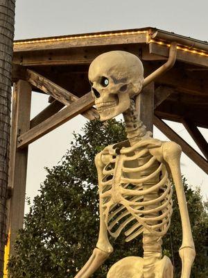 Huge skeleton watching the crowd at Hometown Halloween. Celebration continues Saturday