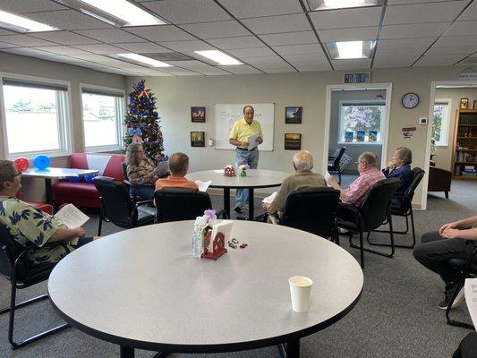 Joe Rossetti teaching our clients about the stock market.