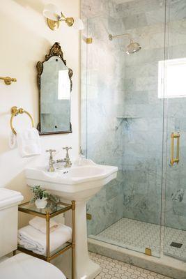 Victorian style bathrooms with modern amenities, including bidets.