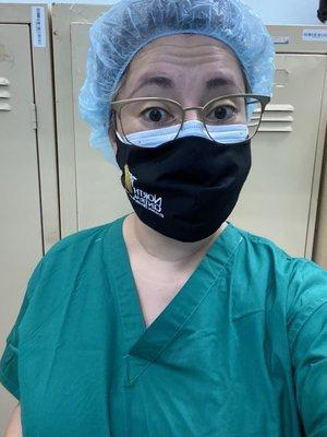 My hospital midwife scrubs and mask in Trinidad and Tobago.