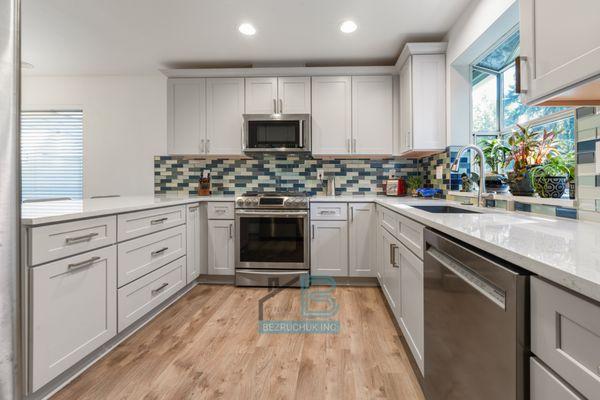 Kitchen with Light gray shaker cabinets