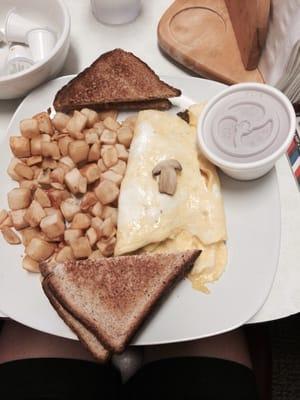 Denver Omelette with American fries and wheat toast.