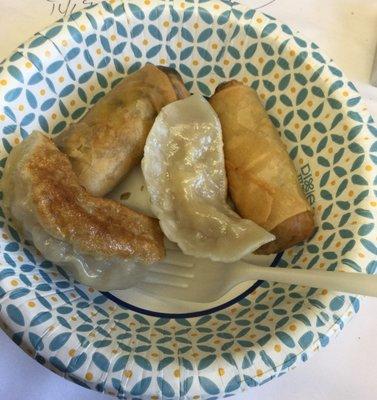 Lukewarm potstickers and egg roll.  The egg rolls look like stumps!