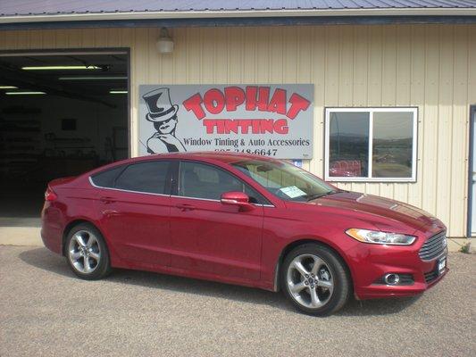 Car we tinted for a customer. Darkest legal for South Dakota 32% on front doors and 13% on back doors and back window.