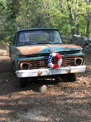 Old Green stands at the entrance to The Little Shop in the Woods and has been in the family for many years. He is not for sale.