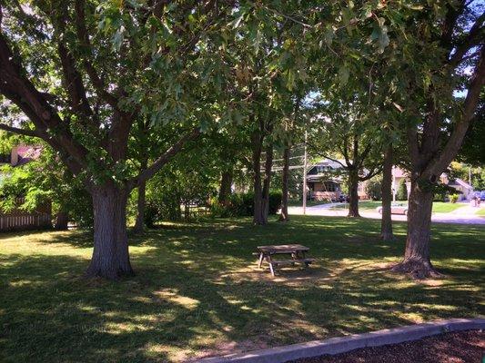 Nice shaded area for parents next to the playground.