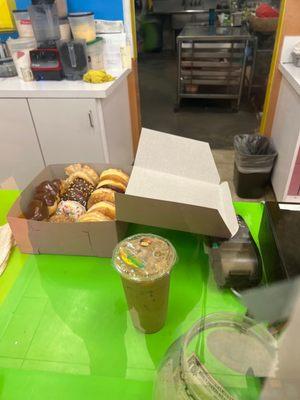 Iced coffee and dozen donuts