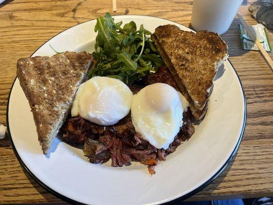 Breakfast:poached eggs over homemade corned beef hash, Multi-grain toast, coffee( with complimentary refill, if desired)