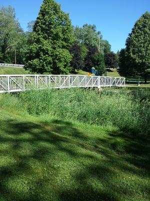 Little bridge to walk over. There is a small playground as well