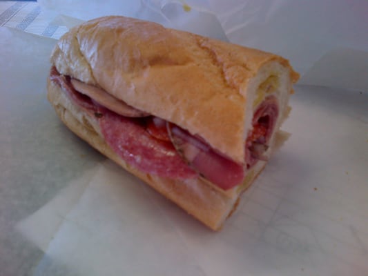 Italian with oil, oregano, black pepper, tomato and onion.  Best bread on the planet.