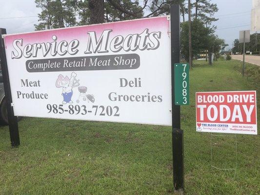 The sign for Service Meats!