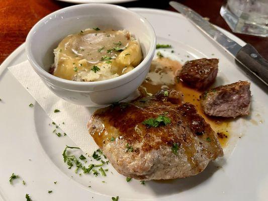 Pork Ribeye steak and mashed potatoes (1/2 portion of what we split)