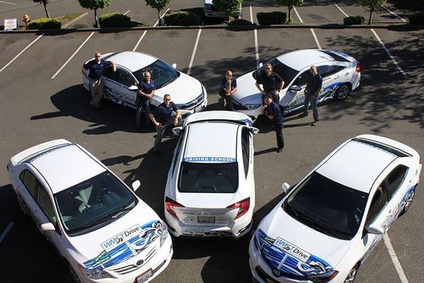 Our Crew with the new cars!