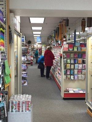 A long aisle of Hallmark cards, among many other things.