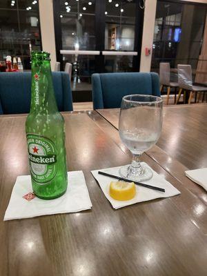 My empty Heineken and water!