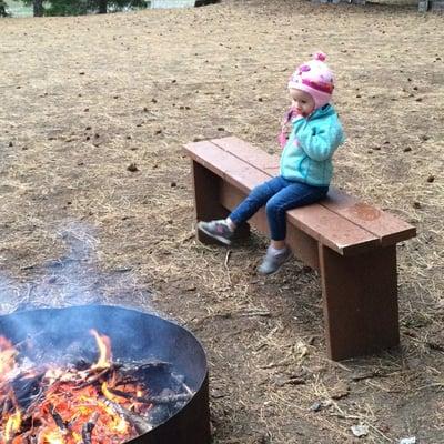 Enjoying the fire in front of our cabin