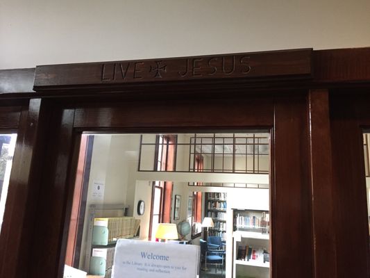 Above library door.