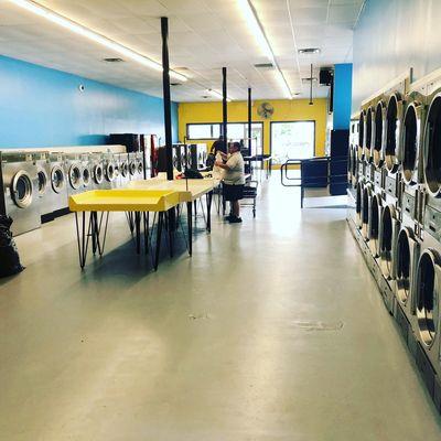 Ice cold air conditioning, fully stocked vending machines and tons of folding tables make for a enjoyable laundry day