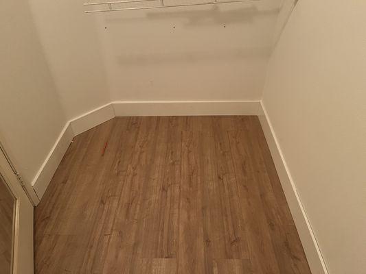 New flooring and baseboard installation