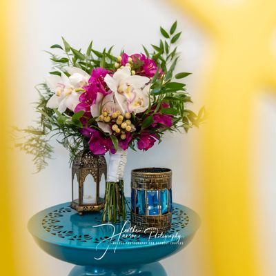 Bright florals and beautiful vignettes of Greece and Morocco adorned Natasia and Jon's wedding at North End Event Center, St. Paul, MN