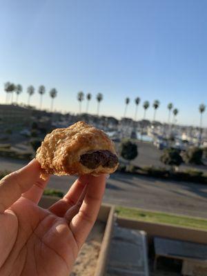 Enjoying my American ube roll in Ventura by the harbor.