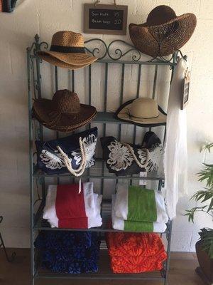 We have Hats, towels, beach bags, cover ups, shorts and cute beach pants