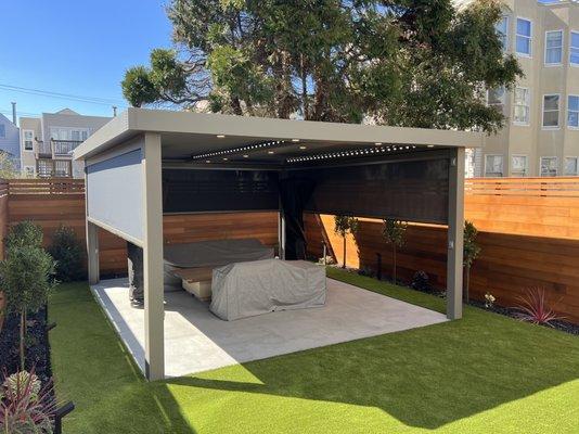 Phantom Motorized Drop Shade on a StruXure outdoor pergola.