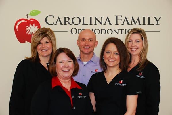 Dr. Lance Fogle and his wonderful team will set your smile straight and pretty~