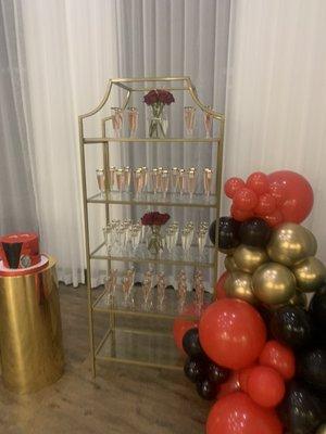 A lively champagne tower for a formal event.