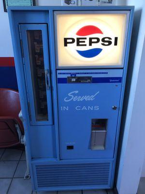 They have this really cool 50s or 60s vending machine in there- still working!