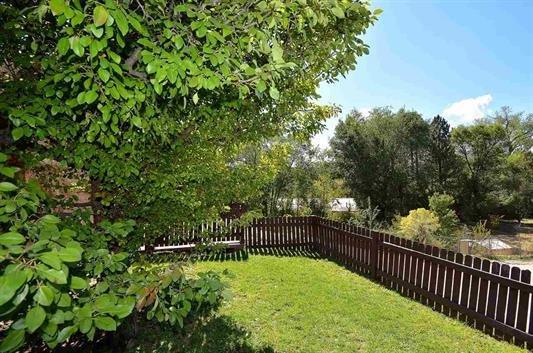 Tesuque home front patio property has surface water